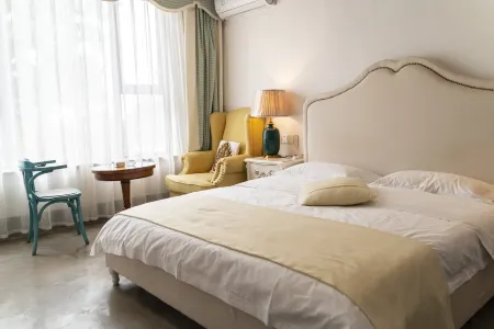 Shao Lin shi jiu ju hotel serent abode Отели рядом с достопримечательностью «Songshan Scenic Area»