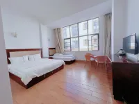 Yiliang Jiulong Tushun Hotel