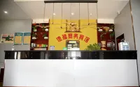 Defu Business Hotel (Yilong Xinzhengzhen Branch)