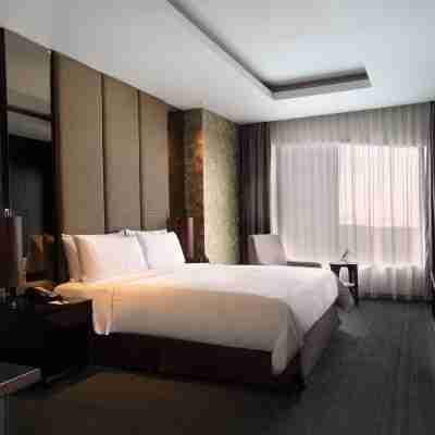 PO Hotel Semarang Rooms