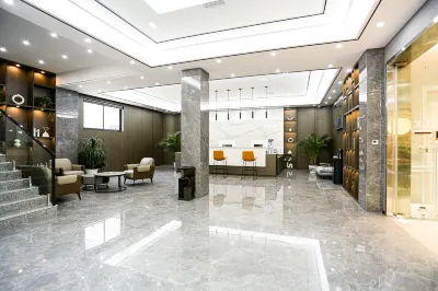 Mengzhou Four Seasons Hotel (Sangpo Branch) Отели рядом с достопримечательностью «Sangpo Central Street»