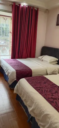 Wuchuan Xingyuan Apartment Отели в г. Вучуань