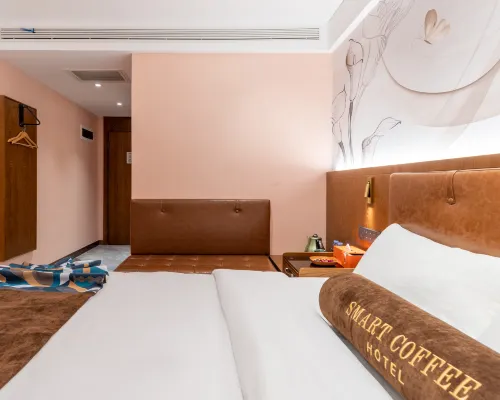 ZK Hotel (yizhuangjingjikaifaquMaqiqiao Branch) Zimmer Photos