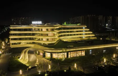 La Yarda Hotel Qihe Отели в г. Цихэсянь