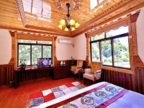 Jinuo Shanzhuang Hostel โรงแรมในเฮ่ยซุ่ย