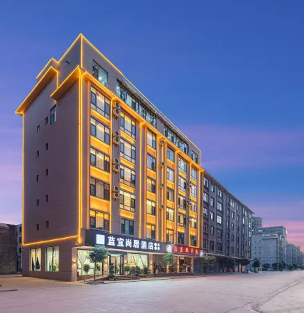 Lanyishangju Hotel (Xihe Park) Отели в г. Цюйцзин