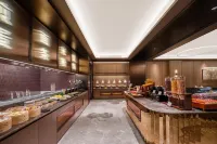 Yining Shandong Road Crystal Orange Hotel - parking