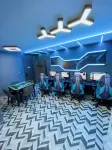 WE E-sports Hotel (Xinyang Railway Station)
