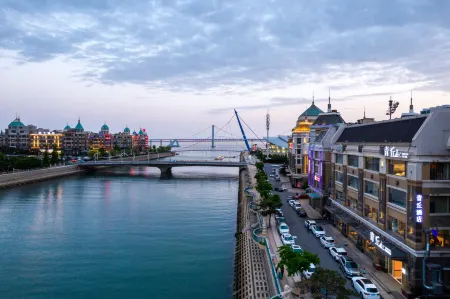 Qing Qiu Hotel Отели рядом с достопримечательностью «Dalian Forest Zoo»