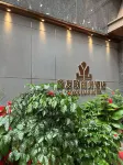 Xinyoulian Business Hotel