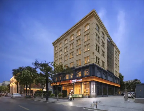 Qianna Hotel (Zhengzhou Erqi Square Dennis David City)