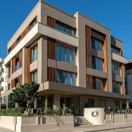 OLI HOTEL & SUITES