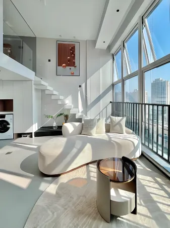 Zizaiju Loft Apartment Hotel Отели рядом с достопримечательностью «Changchun Guanghua University»