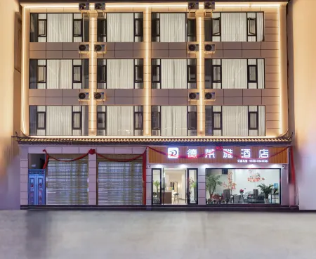 Yongsheng Delaiya Hotel (Branch near Yongsheng County Passenger Transport Station) Отели в г. Юншэн