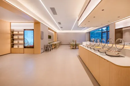 Quanji Guiyang Baiyun District Pedestrian Street Hotel Отели рядом с достопримечательностью «Guiyanghuiyi Center»