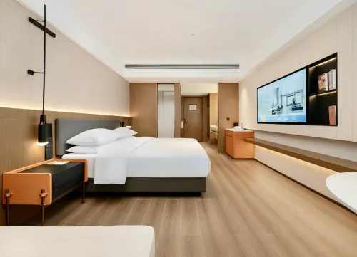 Chenzhou Zhongyi Apartment Hotel - Condos