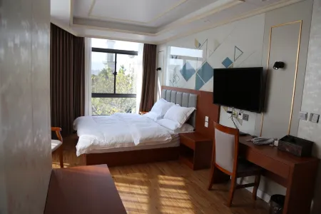 Shadian Ping'an Inn Отели рядом с достопримечательностью «Honghe Vocational and Technical College»