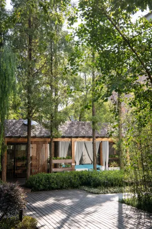 by Sunny Hotel Отели рядом с достопримечательностью «Wangong Dike»