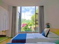Wanfenglin Moonlight B&B Hoteles en Xingyi