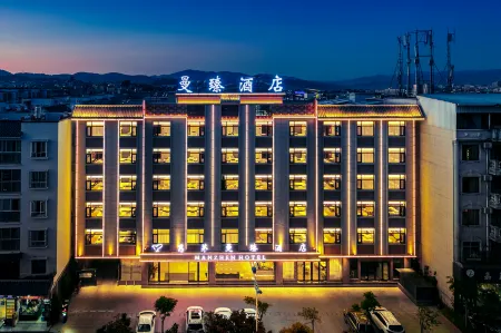 Manzhen Hotel (Pu'er High-speed Railway Station) Отели в г. Пуэр