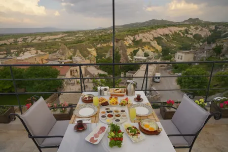 Kappadoks Cave Hotel Отели в г. Tekelli Mahallesi