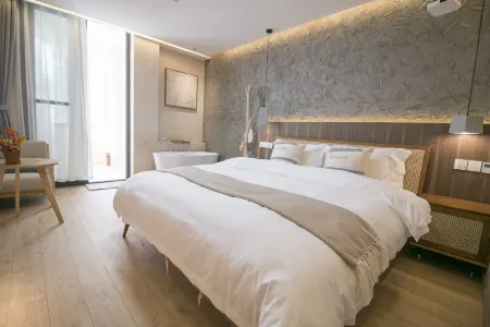 Shaoxing Shiqing Half Hotel
