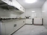 Harbin Tianzhu Apartment - مطابخ