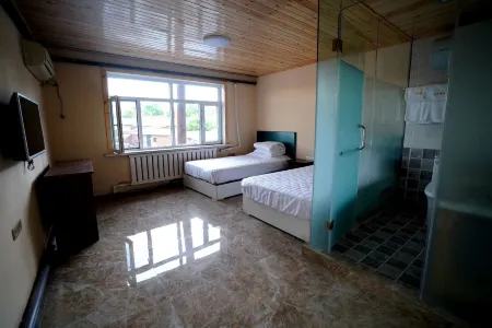 Xiaoxiang Inn Отели в г. Удалянчи