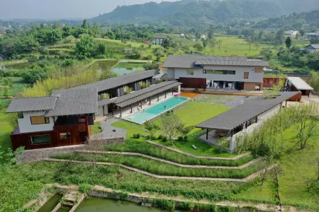 Trip.com Group Country Retreats (Yibin Lizhuang Ruyiyuanxiang Joint Resort) Отели рядом с достопримечательностью «Li Zhuang Lv You»