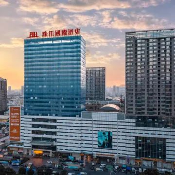 Pearl River International Hotel（Metro station YiJing Lu） Отели рядом с достопримечательностью «Zhongda Wufeng Commercial City»