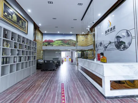 Shicheng Xinhui Hotel Отели в г. Шичен