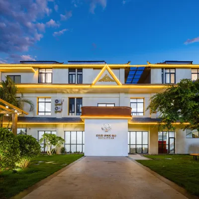 Back Garden · Duoli Garden Hotel (Splashing Water Square Branch, Jinghong, Xishuangbanna) โรงแรมใกล้สวนมันตง
