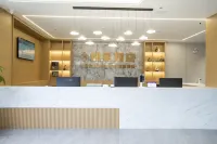 Yujian Hotel (Gushi Xiyalibao Shopping Plaza)