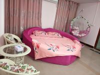 广州春旺主题公寓 - 浪漫主题吊篮圆床房