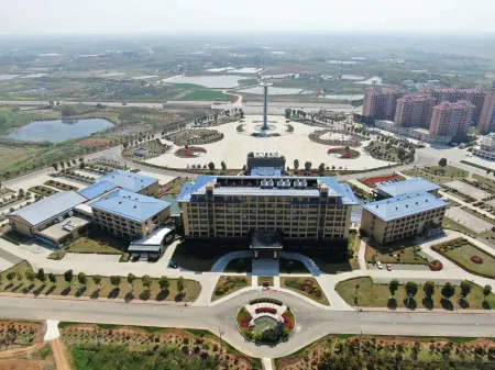 Aiman Hotel Отели рядом с достопримечательностью «CPC Yingcheng Party School»