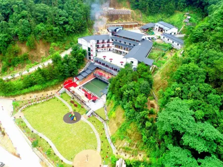 Wanlv Hakka Inn Отели в г. Дунюань