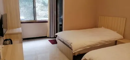 Yishan Hotel, Tongxiang Отели в г. Тунчен