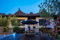 Floral Hotel·Pillow Stone Villa hotel (Xishuangbanna Sunac International) Hotels in Jinghong
