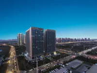 Changchun Manfori Hotel Apartment (Jingyue Mingyu Plaza) Отели рядом с достопримечательностью «Академия туризма Чанчуньского университета»
