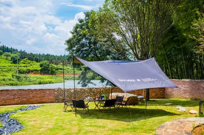 Xunye  Village Homestay فنادق في تشنجَو