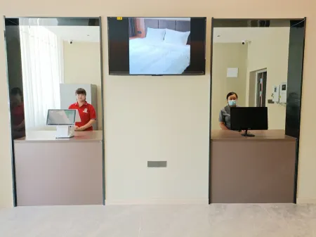 Hualian Hotel Отели рядом с достопримечательностью «Wusong Park»