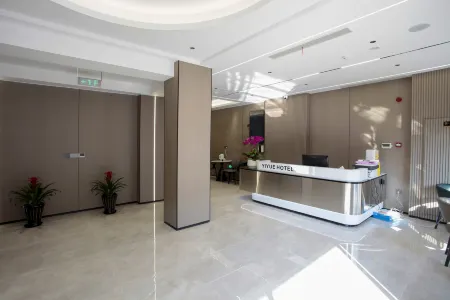 Yiyue Hotel (Linhai Ziyang Street Branch) Отели в г. Linhai