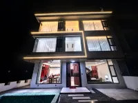 Yaoshan Xu · Natural Qixin | Minimalist Modern Qingning Boutique Stay - en bord de mer