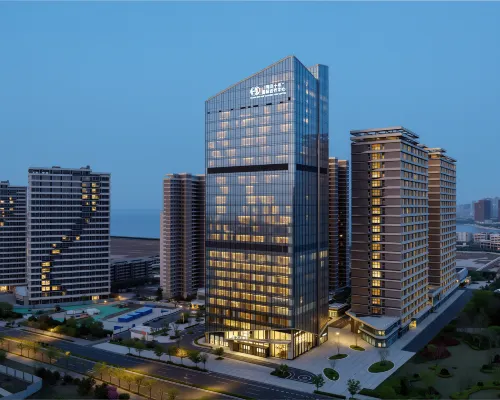 Elong Hotel (Qingdao Oriental Movie Metropolis فنادق في تشينغ داو