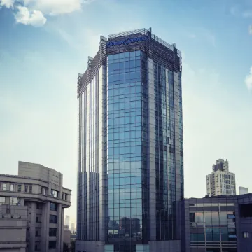 Howard Johnson Huaihai Hotel Shanghai Отели рядом с достопримечательностью «Фуксинг Парк»