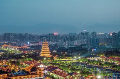 Xi Zhi Hotel (Datang Never Sleeps City Branch) Отели рядом с достопримечательностью «Xi'an Peihua University Stadium»