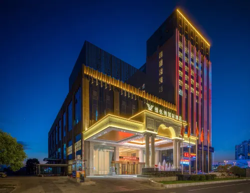 Vienna International Hotel (Zhangshu Times Square Renhe) Hôtels à : Zhangshu