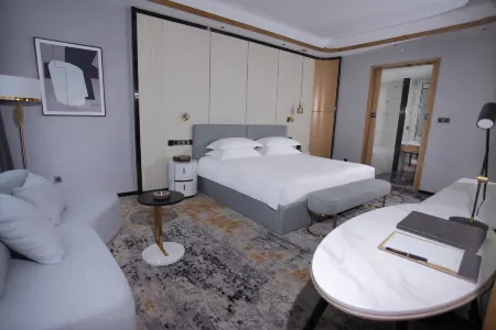 Hualian International Hotel Отели рядом с достопримечательностью «Er'langshen Culture Relics Park»