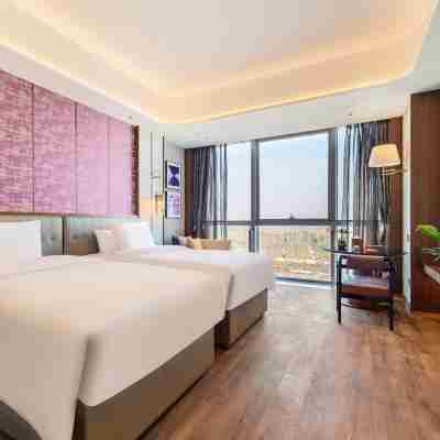 Grand New Century Hotel Suzhou Si County Rooms