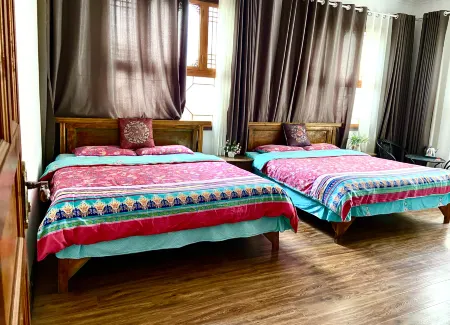 Tianshui Yuanju Inn Отели рядом с достопримечательностью «Immortal Cliff»